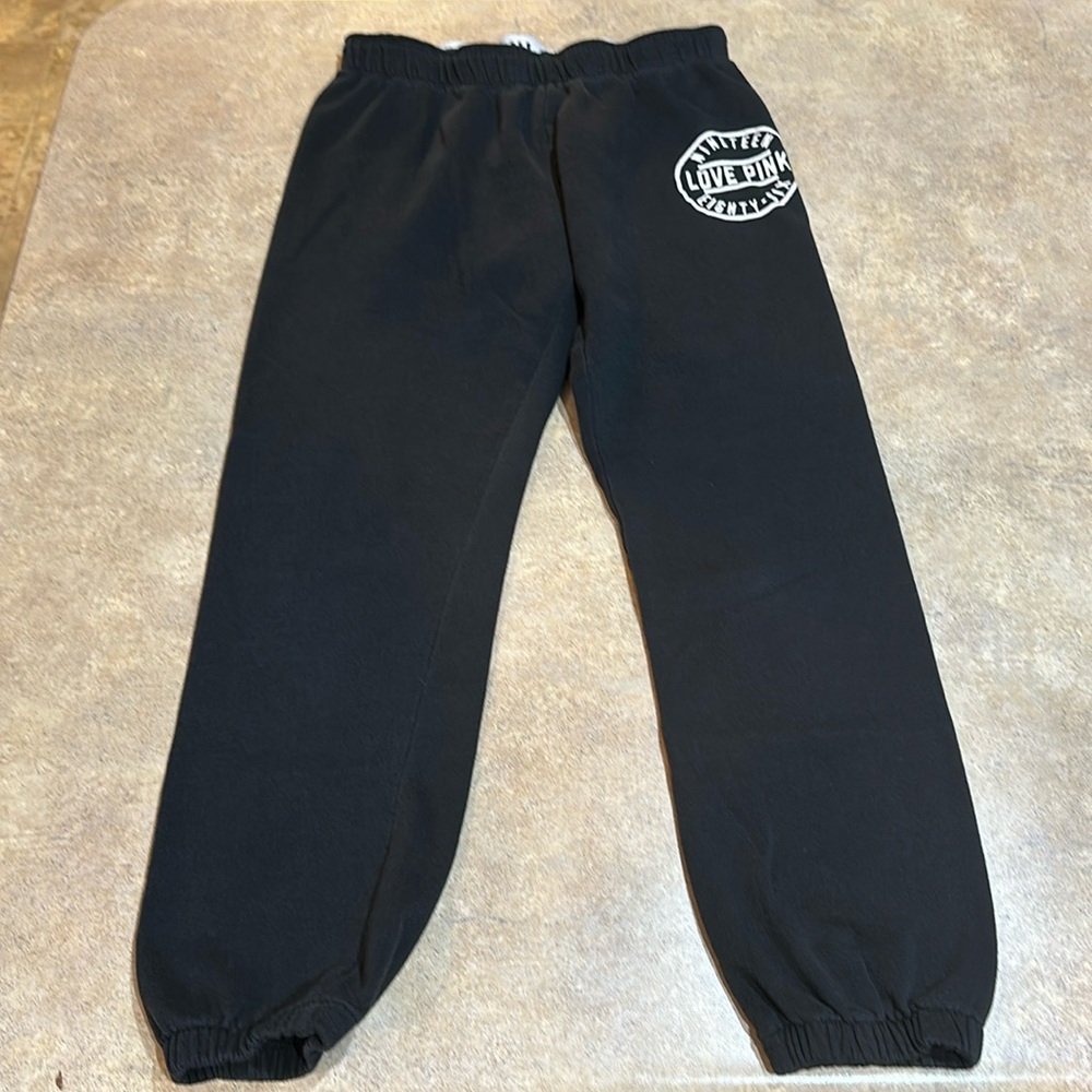 Women’s Victoria’s Secret pink sweatpants size XS, inseam measures about 25”